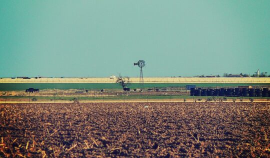 wind pump across pasture