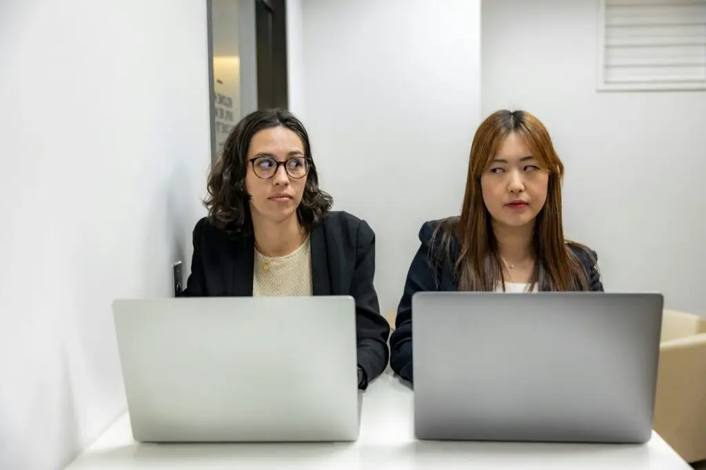 two women having oil and gas dispute