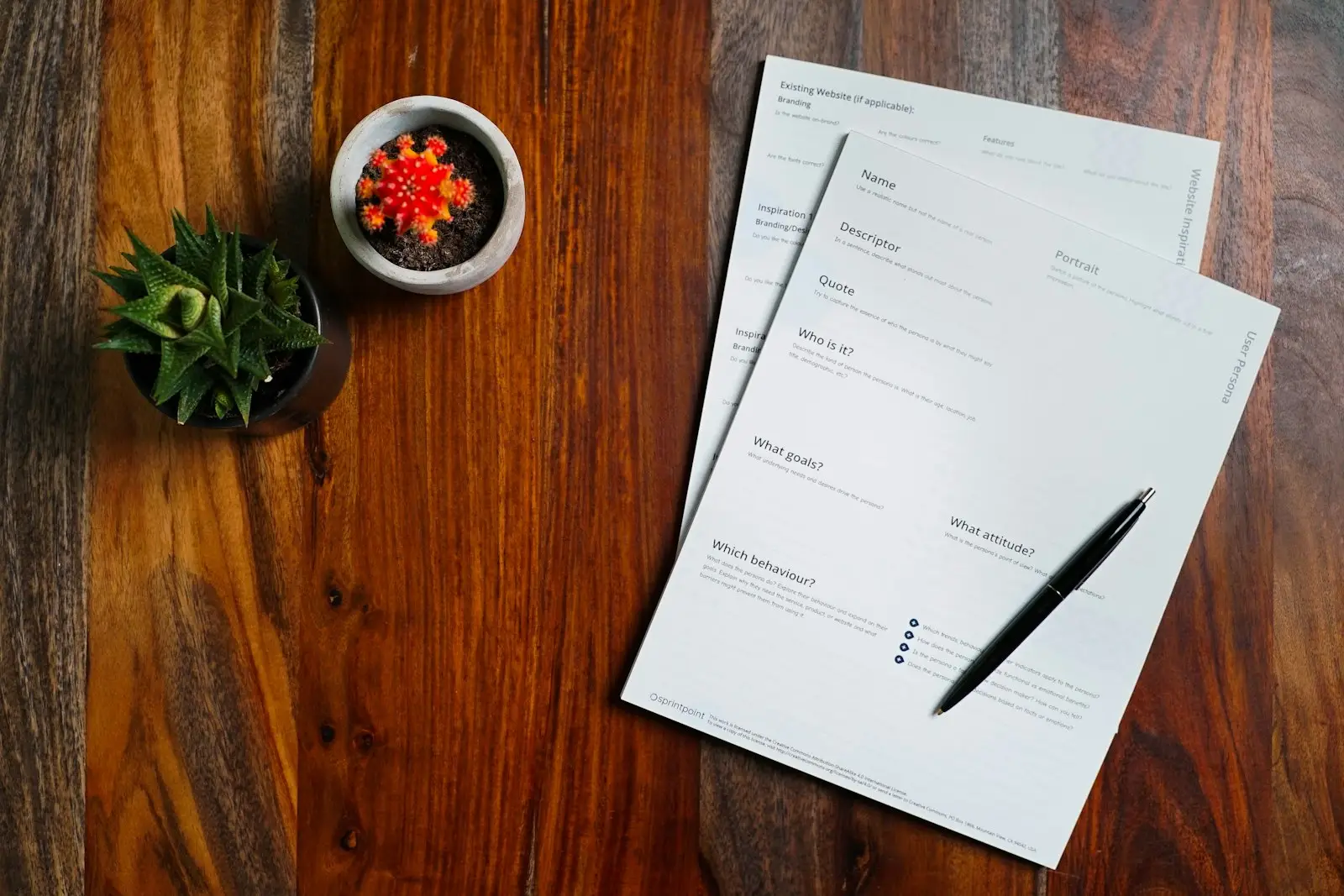dlf-photo-1632152133952-98b268dc4b86 Legal documents and a pen on a table, representing a Texas oil and gas lease and the executive rights duty