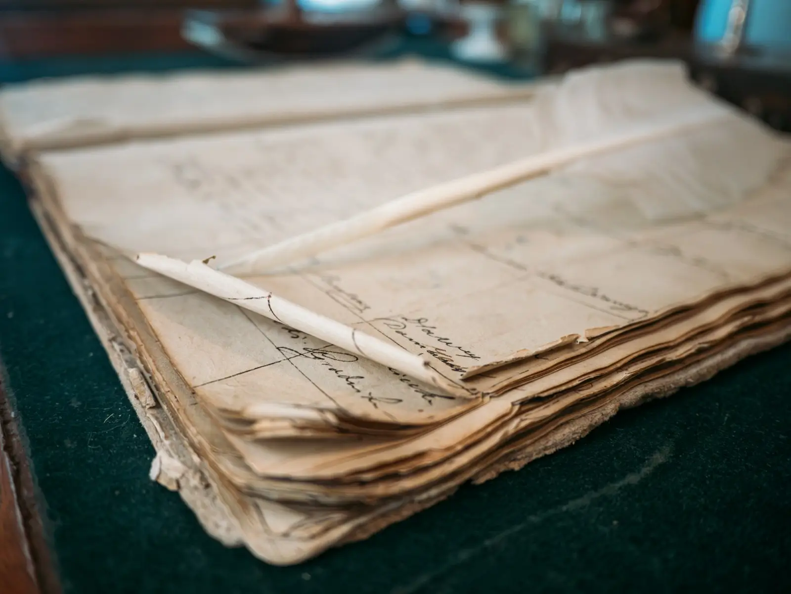 dlf-photo-1760307837453-ce60cb209e52 Old handwritten ledger, like the decades-old mineral deed language a double fraction can hide